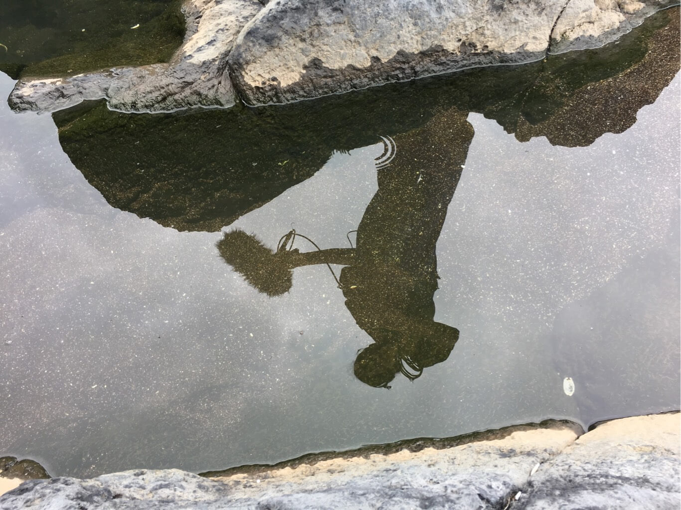 Location recording reflection in water